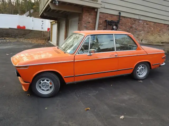 1976 bmw 2002 hot rod! has a e30 6 cylinder engine the car flys! inka orange
