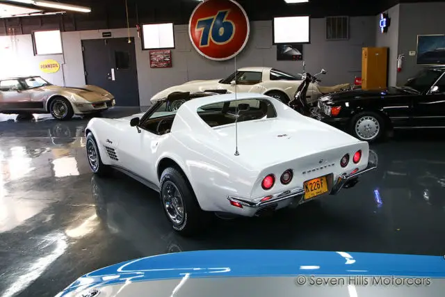 fantastic condition, very low original miles, a/c auto ps pb pw, white/saddle