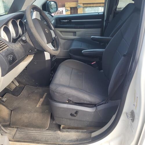 selling for a relative 2010 doge grand caravan has factory remote start, dvd playe