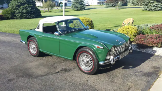 restored 1967 triumph tr4a british racing green w/ black white piping