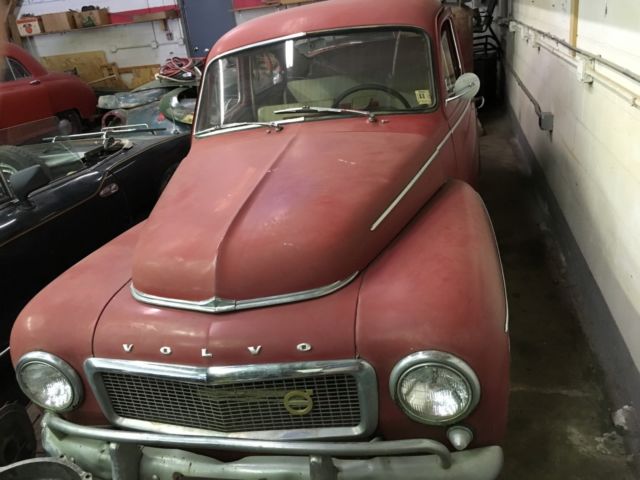 1959 volvo pv544, red, with red and white interior