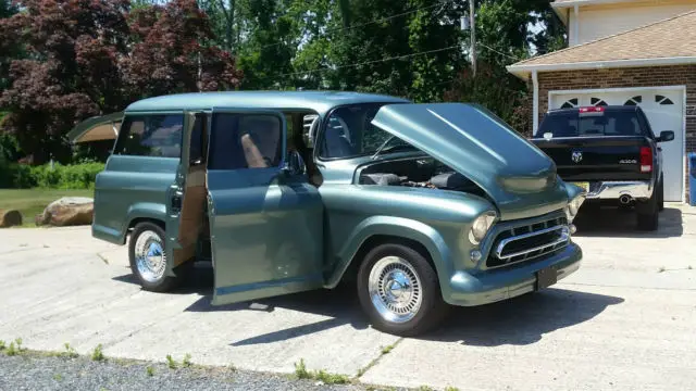 57 chevrolet suburban on a 2006 4x4 tahoe chassis. watch video to see in action