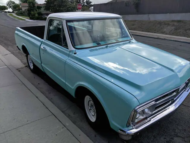 1967 gmc seafoam green & white short-bed pickup truck