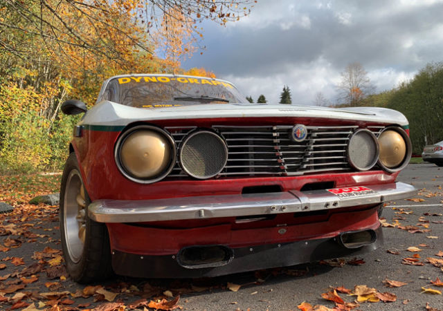 alfa romeo gtv race car with vintage livery and rebuilt engine