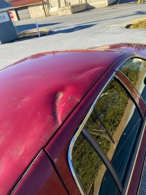 1994 cadillac fleetwood sedan red rwd automatic base