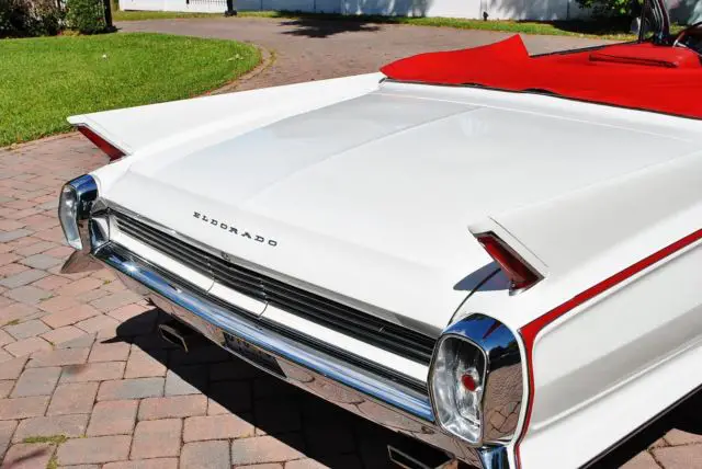 olympic white w/ maroon leather interior from factory power steering & brakes