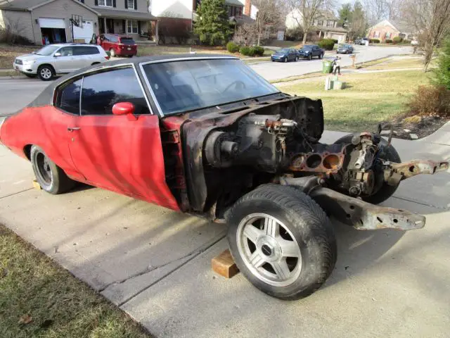 no reserve. matching numbers. factory fire red black bucket seats. project car!