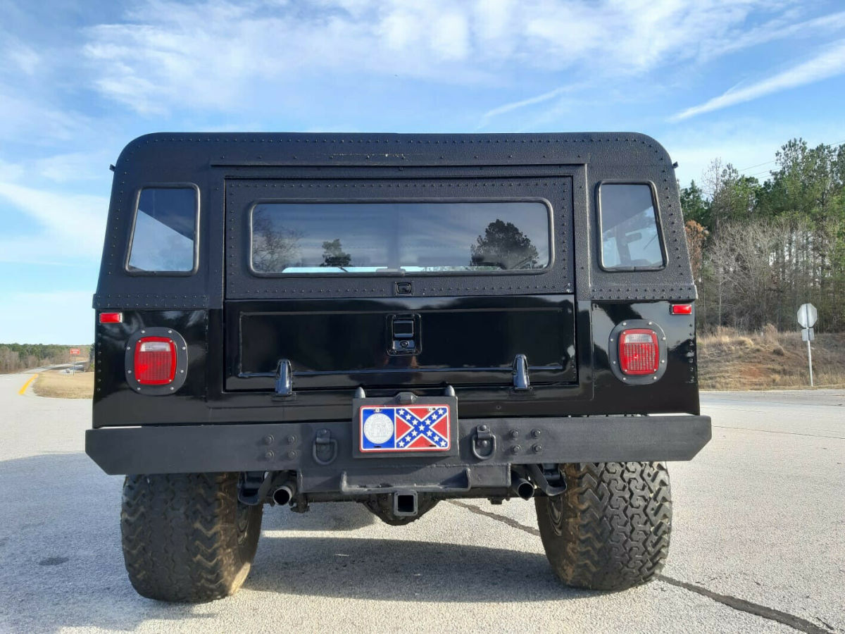 hummer h1 luxury black suv 350v8 gas engine auto 4x4 ac video free delivery