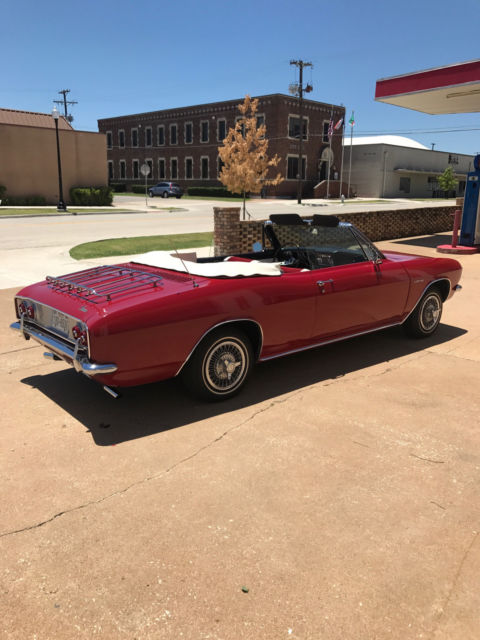 bright red convertible corvair corsa