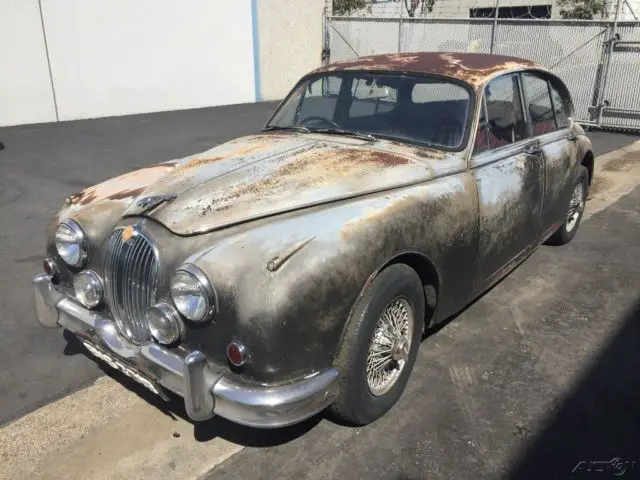 1964 jaguar mk 2 sports saloon. golden sand/red. rhd. 4-speed w/od. wire wheels