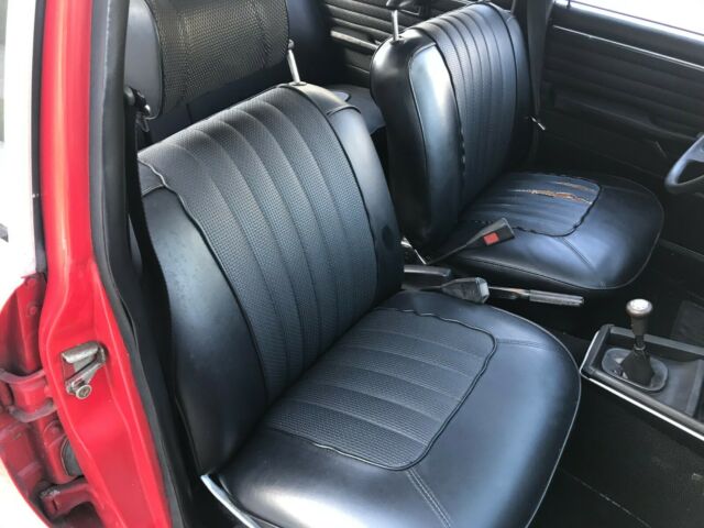 1973 bmw bavaria, red with black interior. 4-speed transmission dual carbs