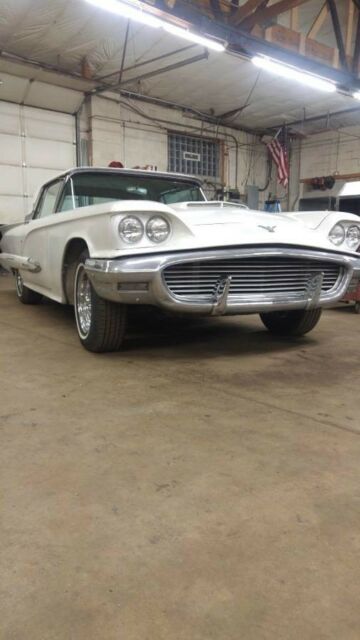 white ford thunderbird with 110,000 miles available now!