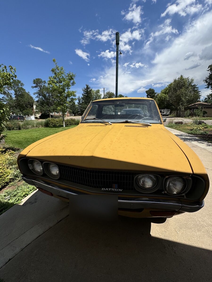 1973 datsun 620 yellow