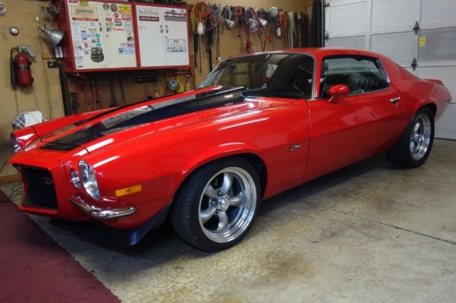 red chevrolet camaro with 5,000 miles available now!