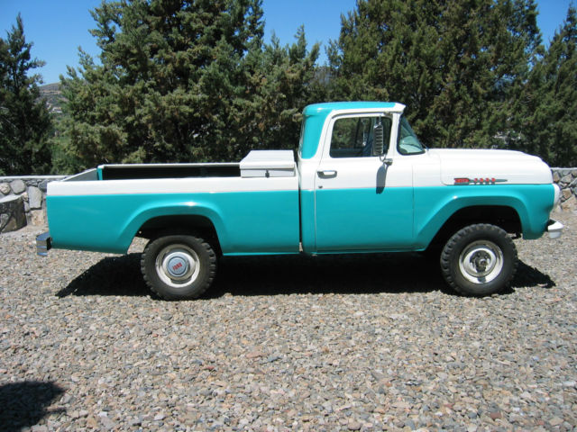 turquoise/white, manual 4 speed, 8 - cylinders, runs very quietly