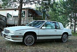 low mileage cadillac biarritz with 4.9 motor, triple white