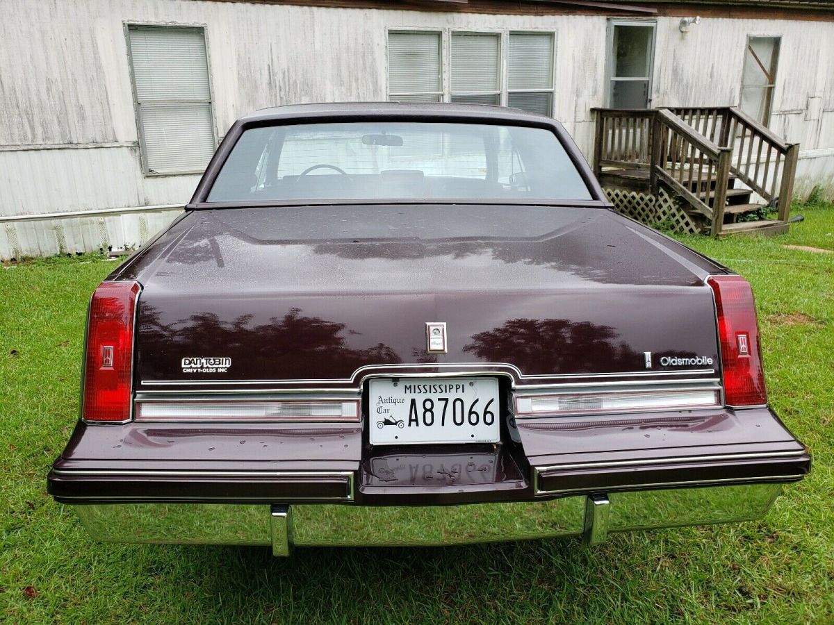 1986 oldsmobile cutlass supreme coupe red rwd automatic brougham