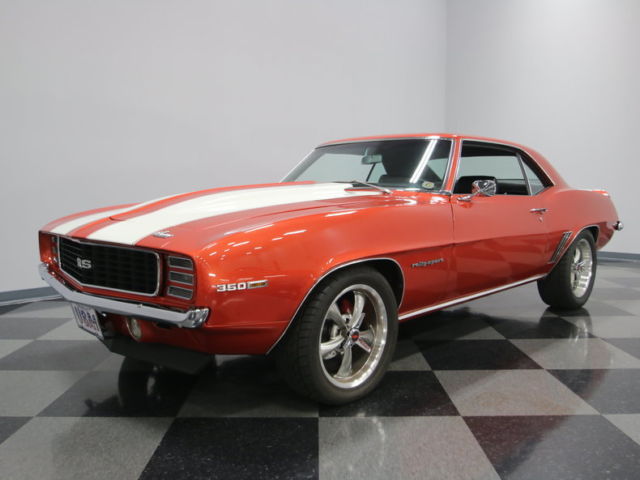 built crate motor, 4 wheel discs, vintage air, beautiful cinder red, 2k on resto