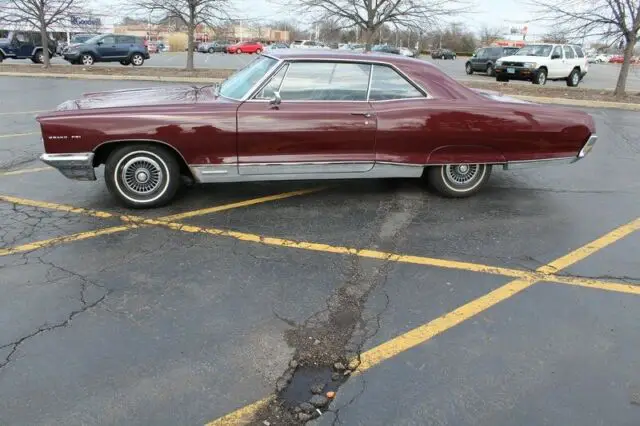 burgundy/maroon pontiac grand prix with 45,000 miles available now!