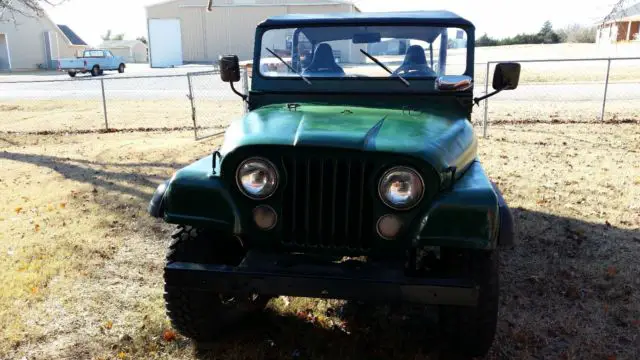 jeep cj 7 1974 3 spd, bikini top, half doors. runs great, 304 v8, good tires