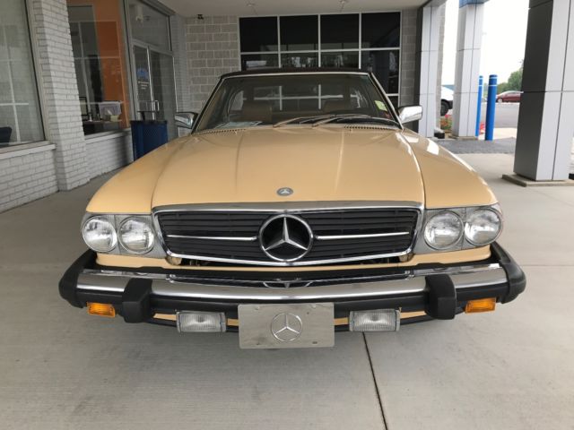 380sl great condition both tops refreshed paint yellow tan interior brown top