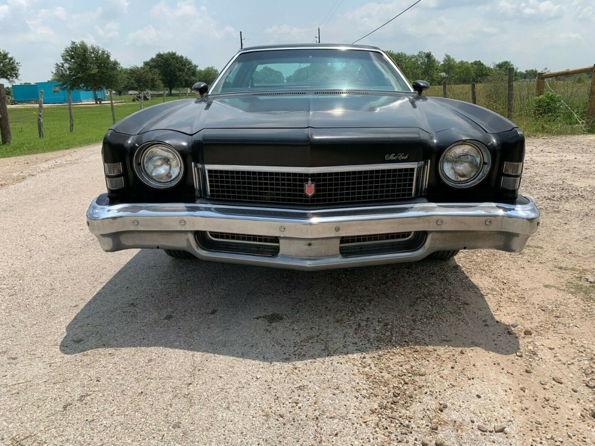 1973 monte carlo landau - black on black, auto, column shift, bench