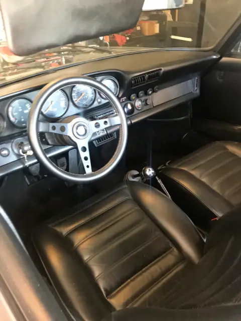 triple black porsche 911 targa. clean