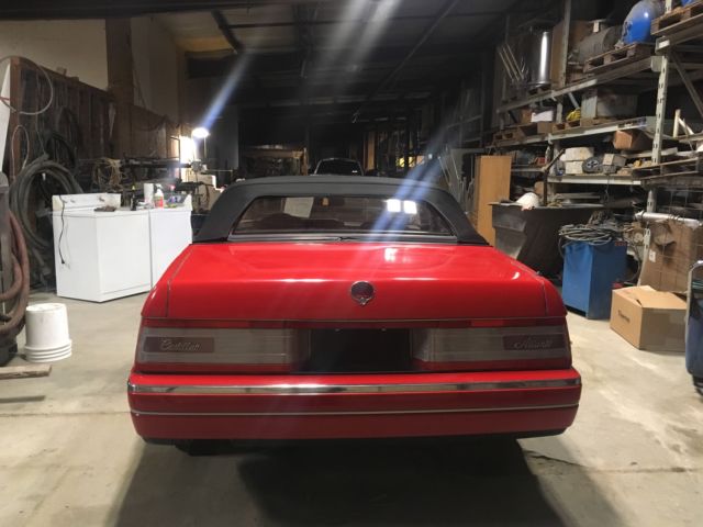 1990 red cadillac allante convertable in great shape with car cover