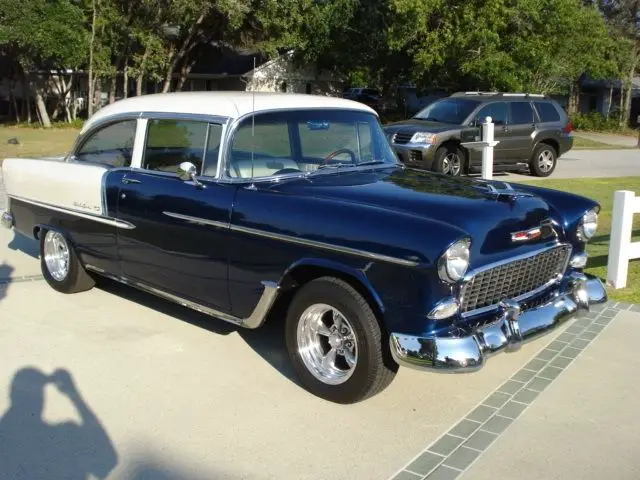 55 chevy belair,2 door post,body off resto, 350 cu. in.,leather interior