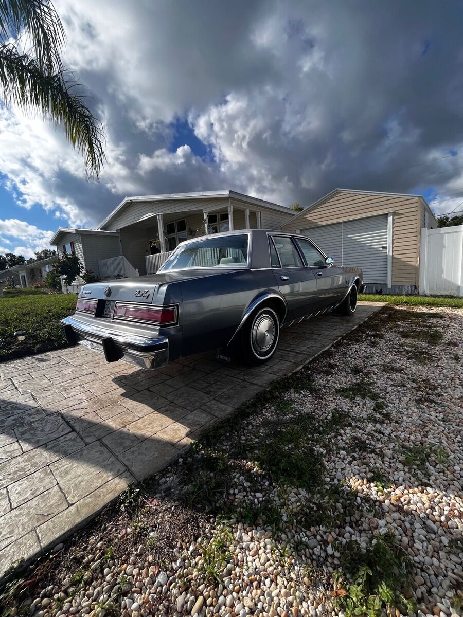 1985 plymouth gran fury sedan blue rwd automatic caravelle