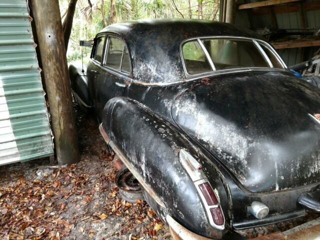 $6,000 1946 cadillac including misc. parts clean title