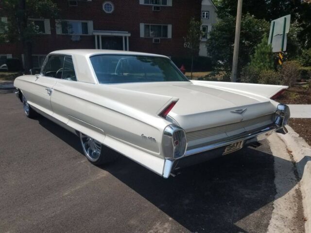 white cadillac coupe deville with 65,000 miles available now!