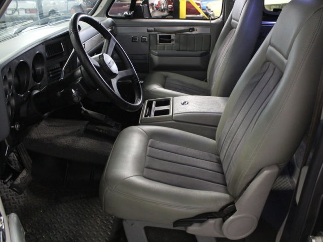 full cosmetic restoration, upgraded leather seats, fresh paint, dakota gauges