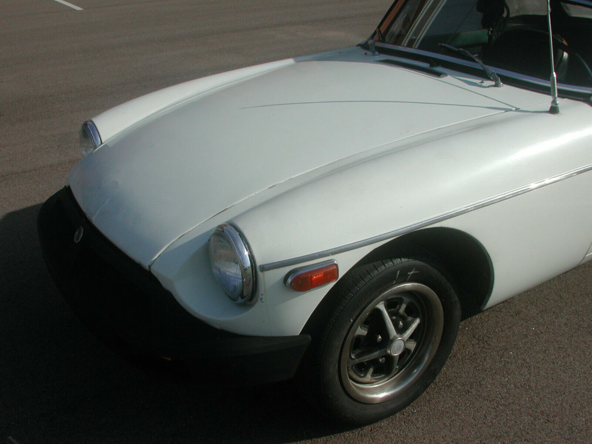 1980 mgb, 4 speed, 1800cc, runs great, all gauges work, low reserve