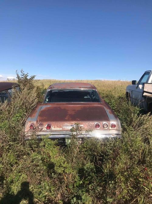 rare 1965 1/2 chevy caprice 4 door hard top. with original 327 and tranny. $25