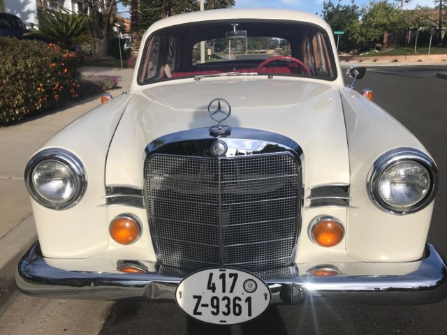 1961 mercedes 190 ponton leather interior, white wall tires,new chrome,runs well