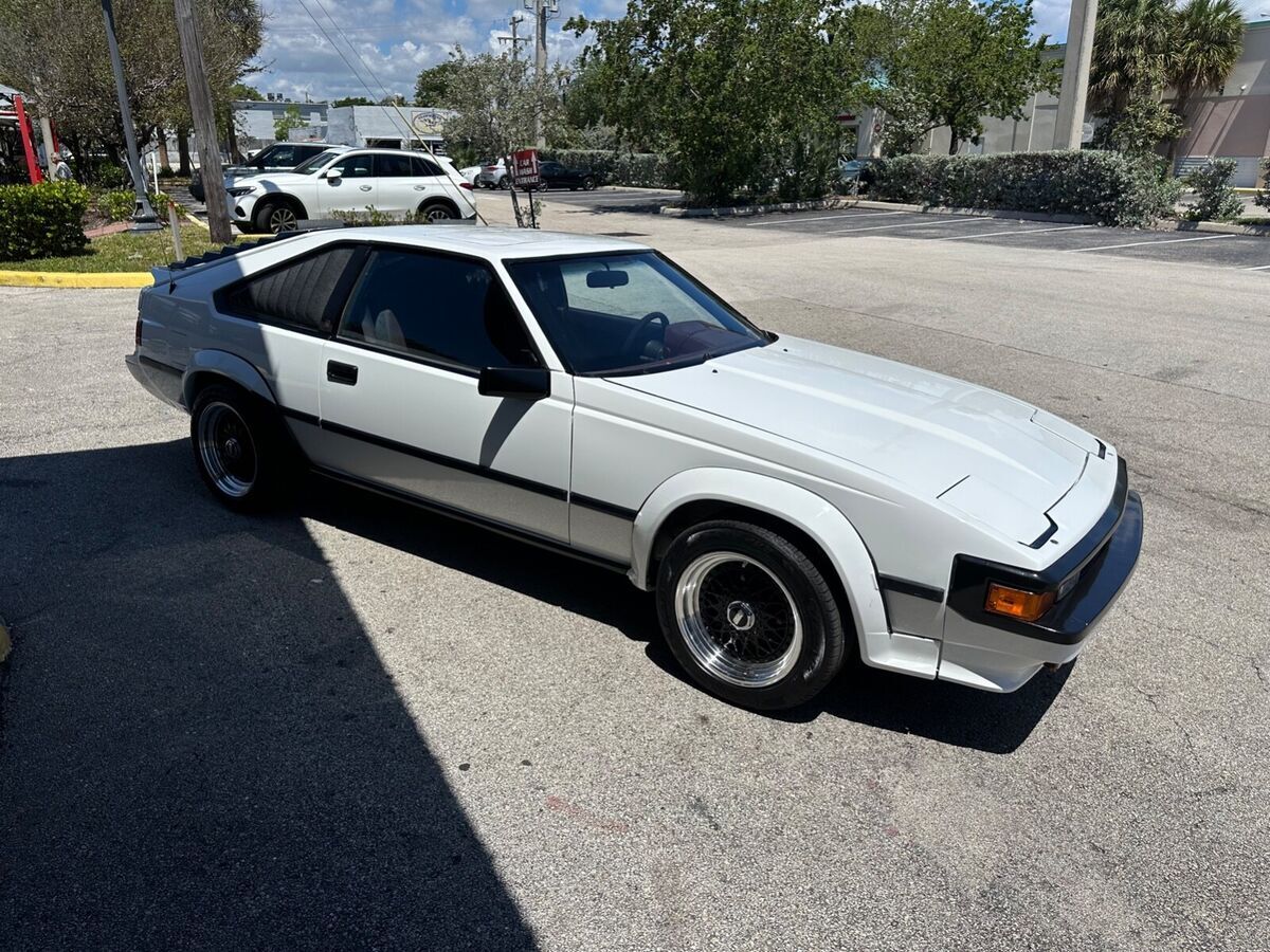 fuel injected 2.8l i6 5 speed manual power 4 wheel disc