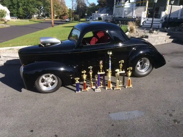 *1941willys split-window coupe* lot with 2 other cars
