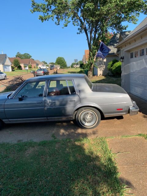 1987 oldsmobile cutlass supreme sedan red rwd automatic