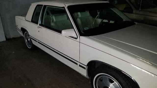 1991 white cadillac coupe deville