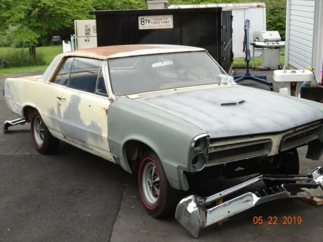 1965 gto hardtop, phs documented, in need of restoration. many new parts
