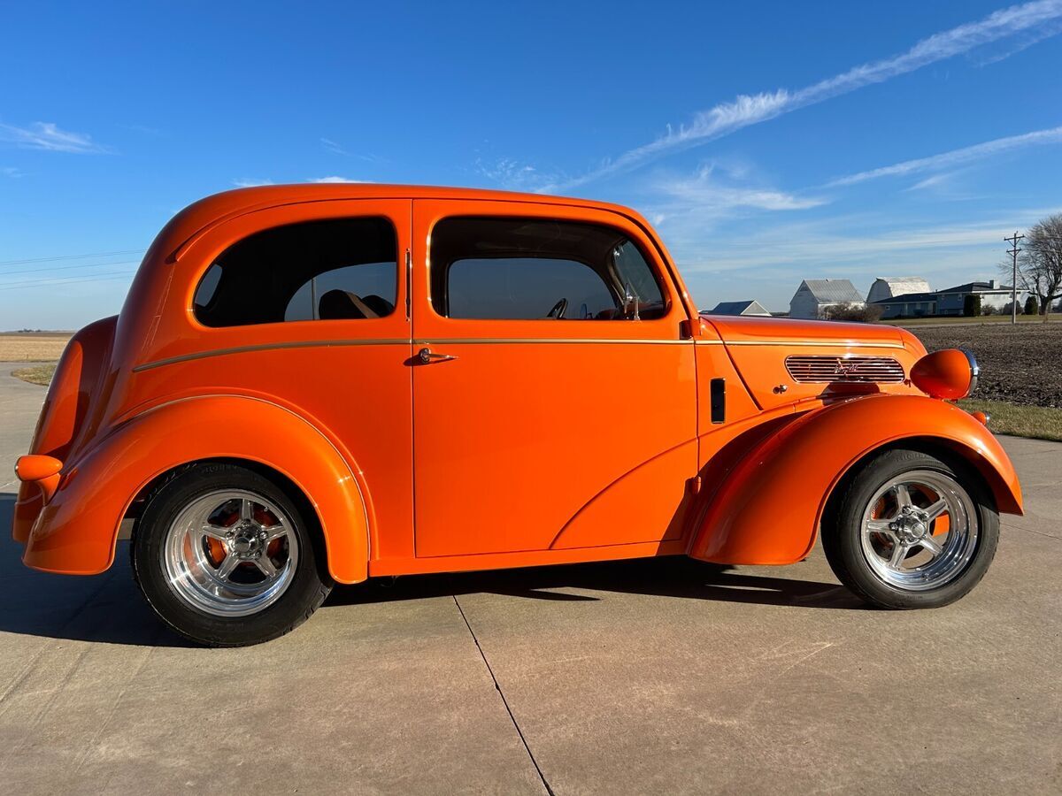 selling a custom 1948 ford anglia. color: tangelo. one of a kind