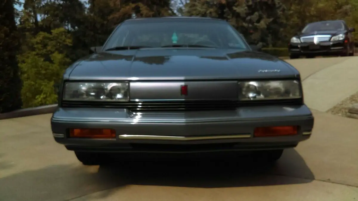 1991 oldsmobile cutlass calais sedan grey fwd automatic red pinstripe