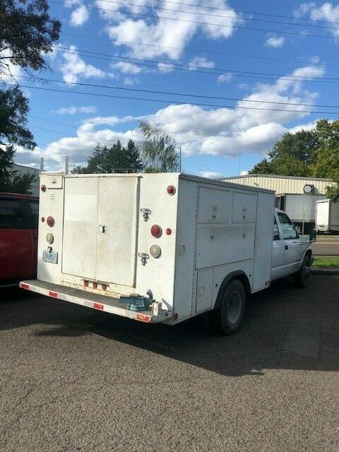 chevrolet 4 door crew cab service truck, dual rear tires, automatic, 454 gas v8