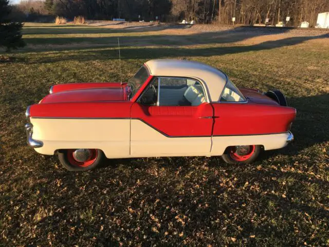 1960 nash metropolitan 43083 miles / /red and white / 4cyl manual new brakes