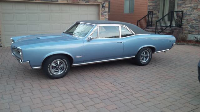 1966 gto 389 tripower