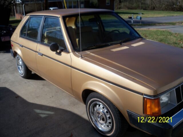 1985 plymouth horizon, 35,000 miles, 4dr,hatchback, 4 cyl, automatic, a/c, am/fm