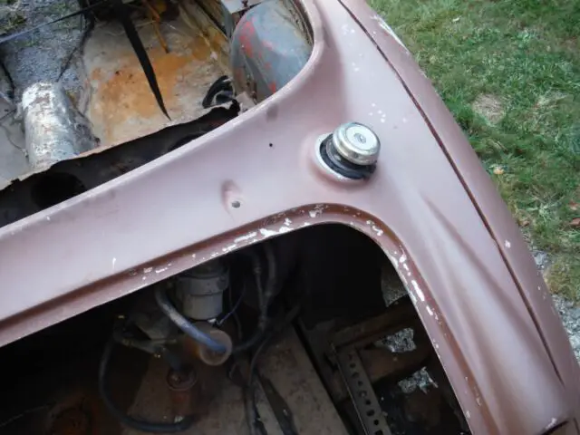 had a chevy v8 in it back in the old days. shrouds in excellent condition