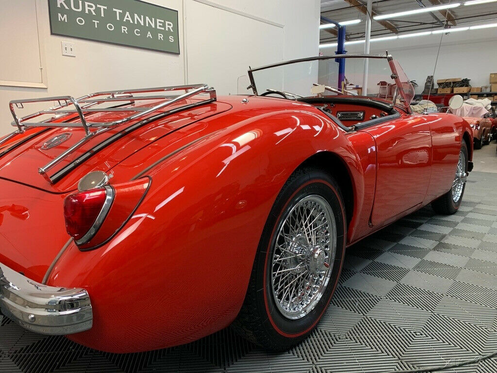 1957 mga 1500 roadster. chariot red w/ black trim. 1800 b engine. strong driver