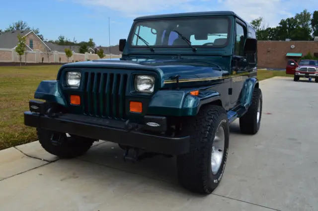 restored jeep wrangler yj with renegade decals, hard top hard doors, 4.0 l nice!